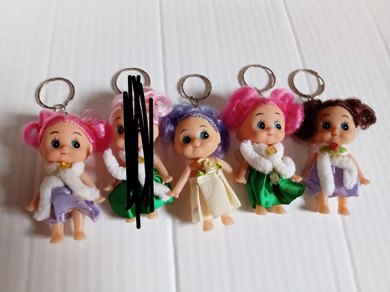 4 Chaveiros bonecas