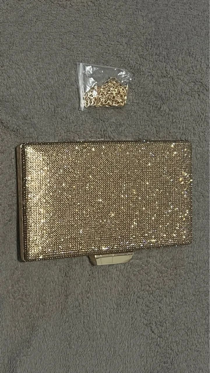 Bolsa de mão glitter dourada com corrente - Foto 2