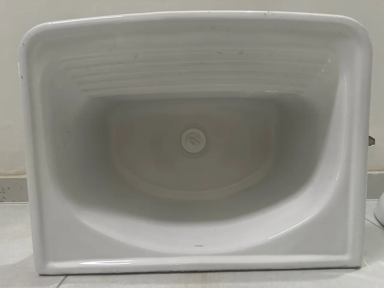 Tanque em louça- Marca da Deca
