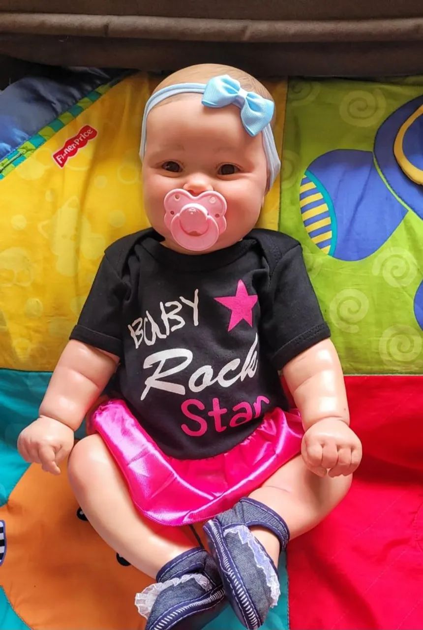 Bebês  reborn toda de silicone pintura do cabelinho ao corpo 