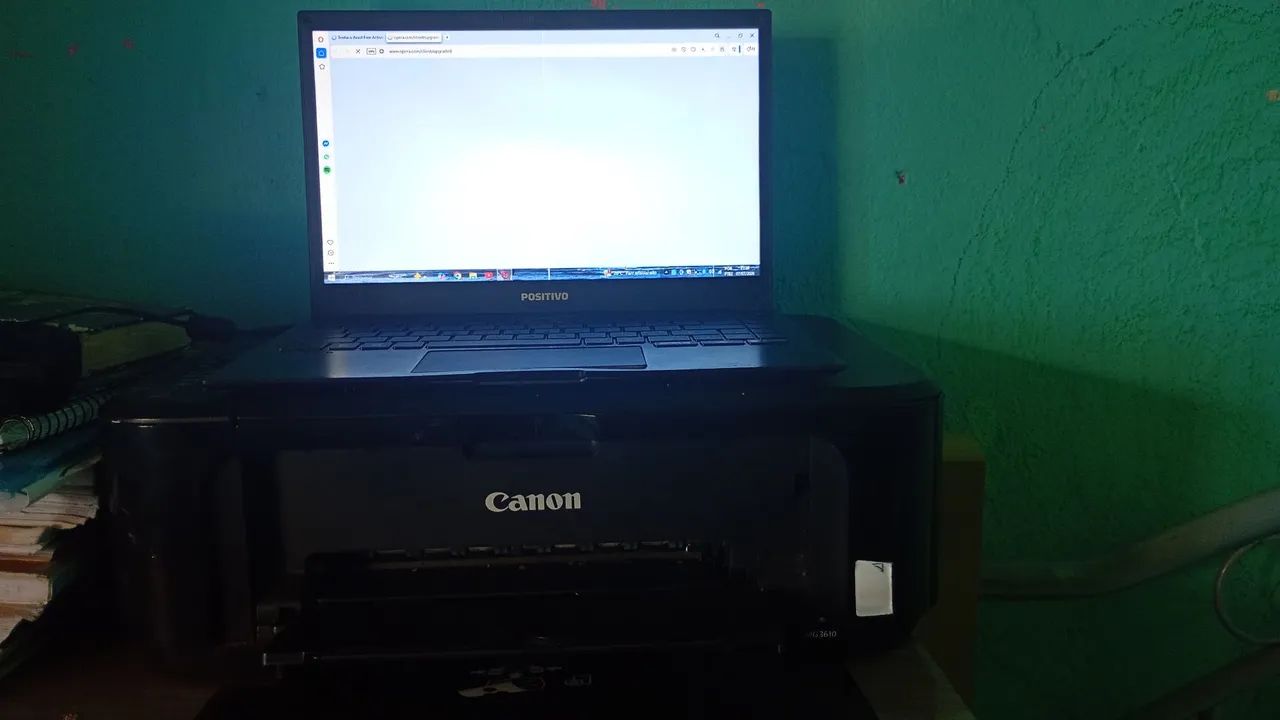 Notebook positivo e impressora 