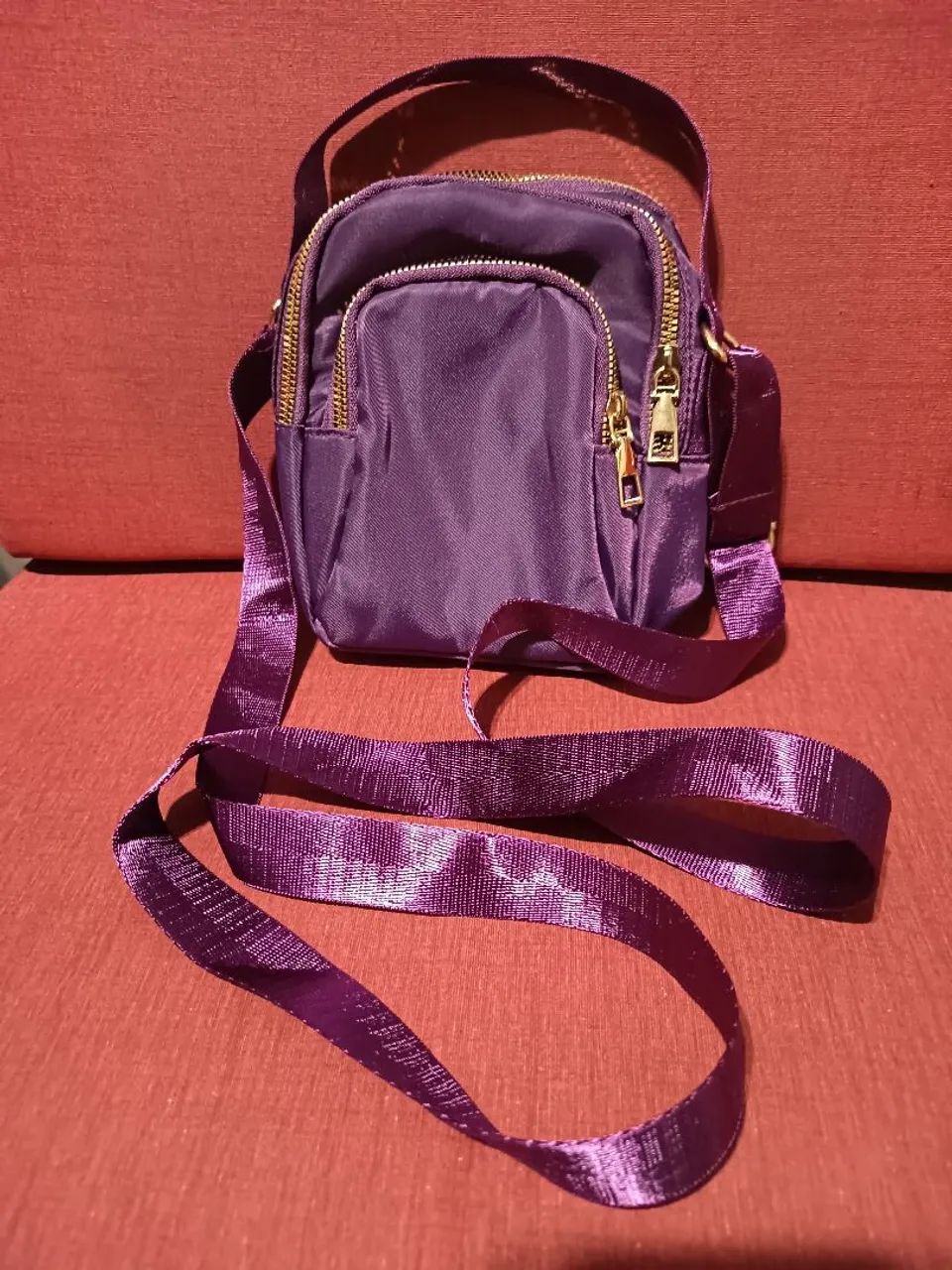 Bolsa roxa transversal 14x19x8 nova