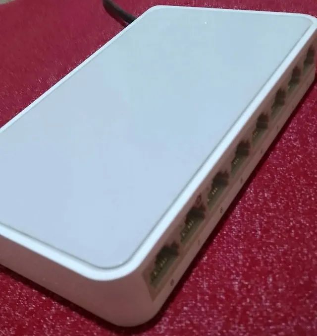 Switch tp-link 8 portas - expanda sua rede com velocidade e estabilidade!