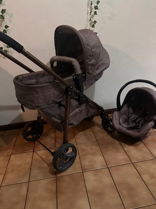 Carrinho de bebê + bebê conforto galzeramo