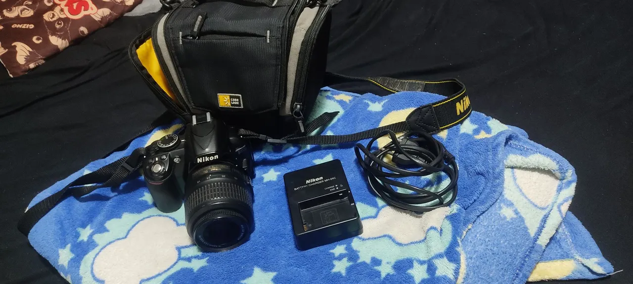 Nikon D3100 + Lente 18-55mm + Carregador + Cartão 32GB + Bolsa