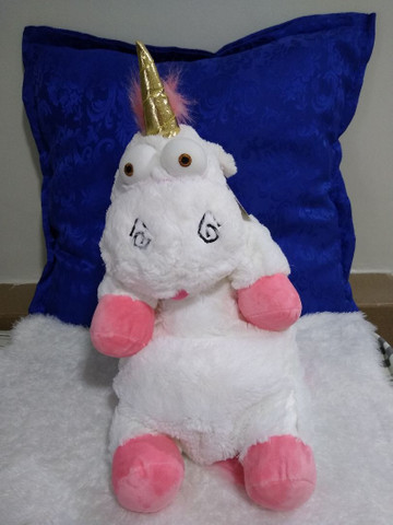 Mochila unicórnio de pelúcia