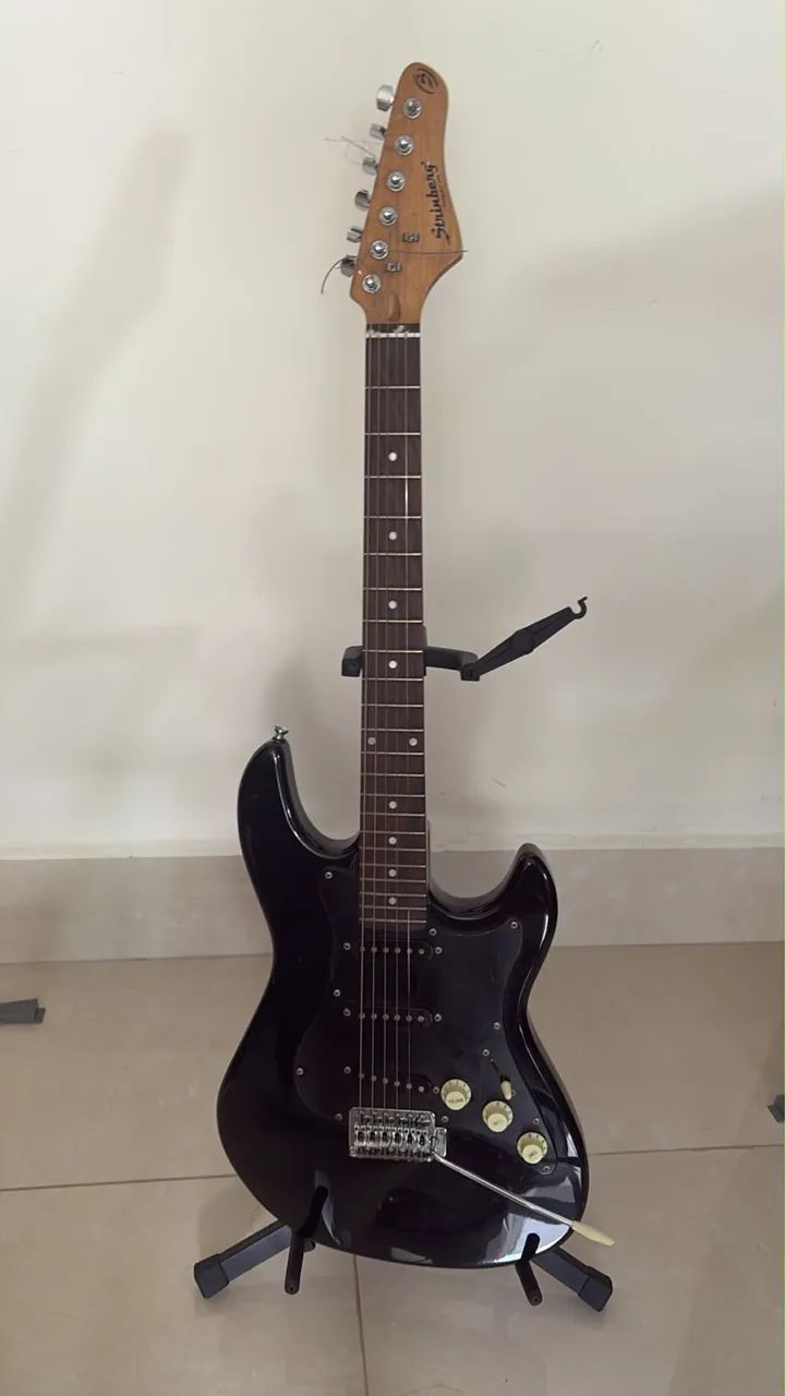 Guitarra com amplificador 