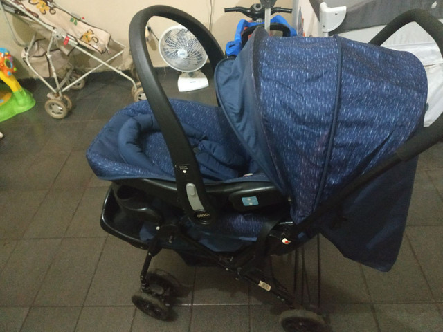 Vendo carrinho de bebê com bebê conforto - Foto 2