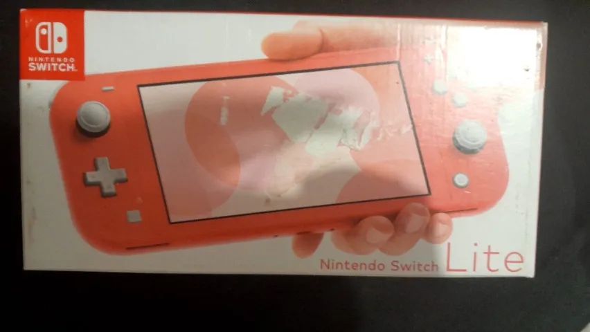 Nintendo switch coral lite na caixa com jogos, acessorios, e amiibo animal crossing - Foto 4
