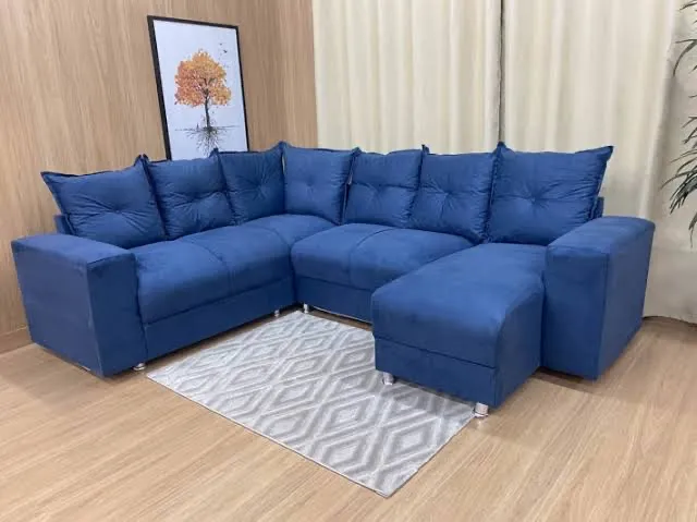 Sofá de canto azul confortável