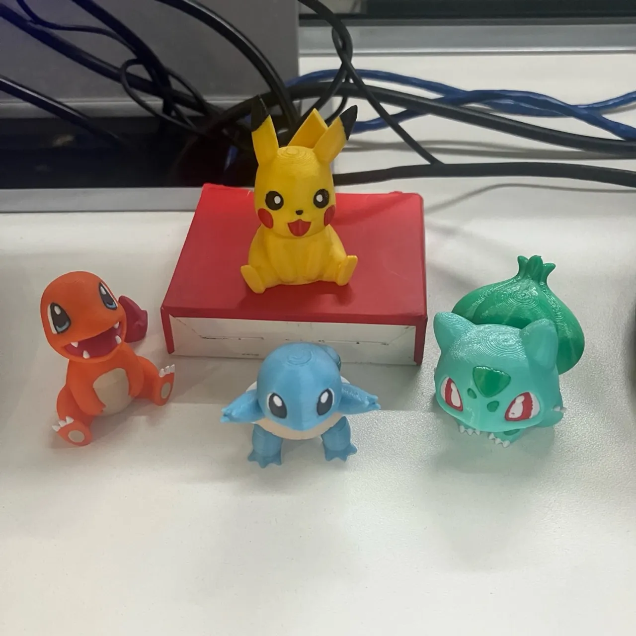 Pokémon 3D: Charmander, Squirtle, Bulbasaur e Pikachu