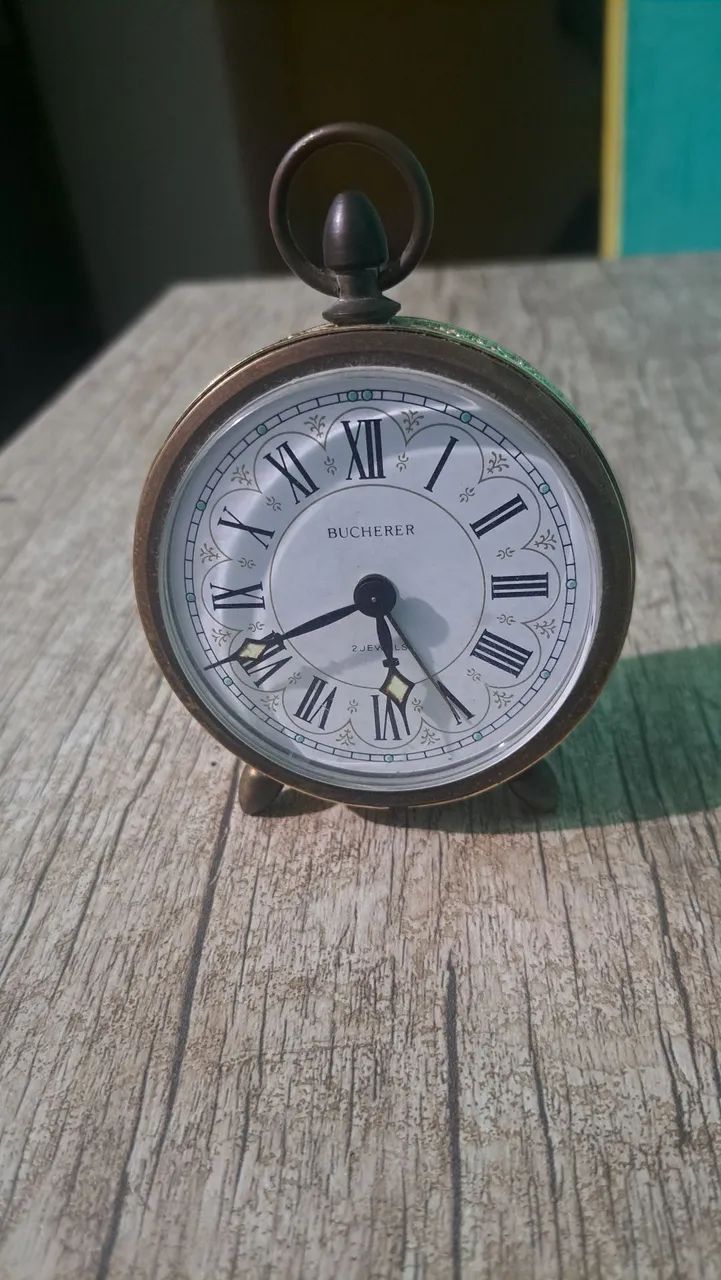 Relogio antigo de corda bucherer