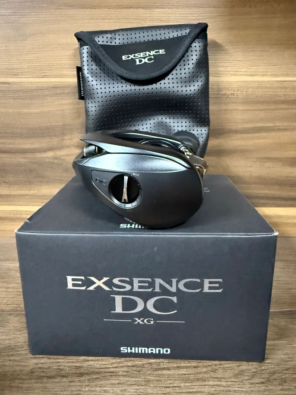Carretilha Shimano Exsence Dc Xg Left Cor Preto Lado Da Manivela