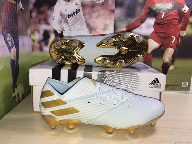 adidas nemeziz dourada