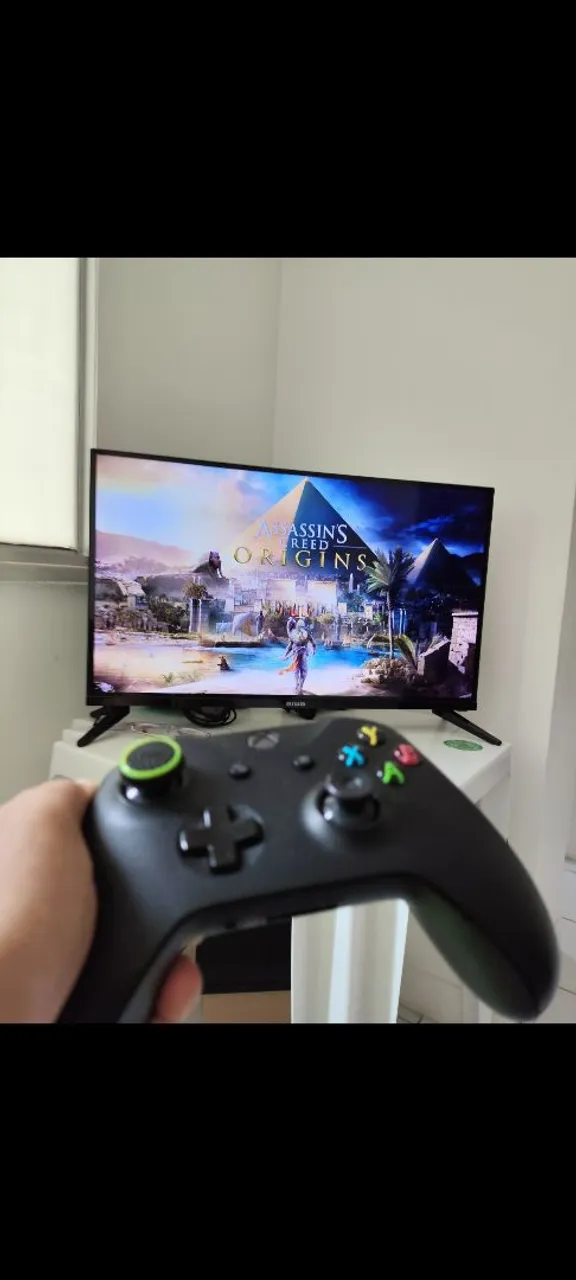 Console Xbox com Assassin's Creed Origins