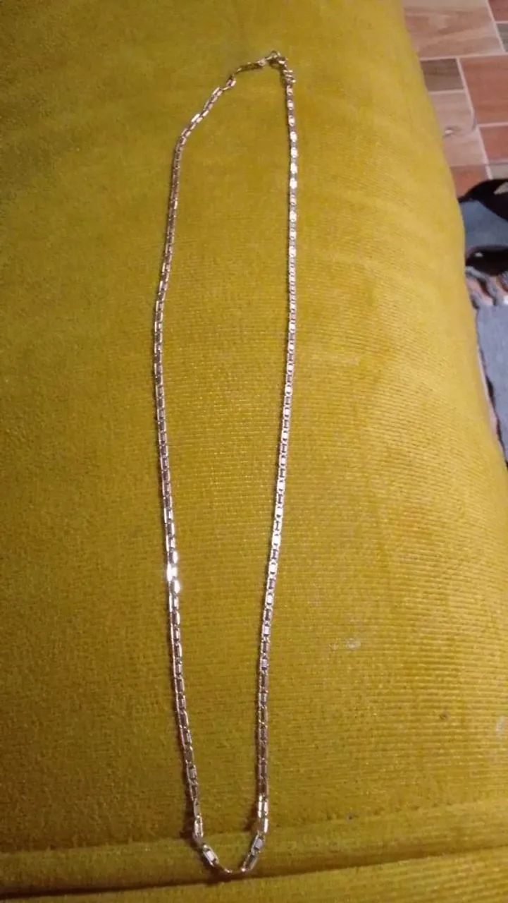 Vendo esse cordão da romannel um mês de uso 
