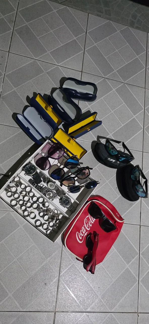 Lote de relógios, oculos e anéis 