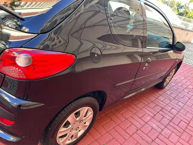 207 XR 1.4 flex 2011 2 pts Raridade só 90 mil KM Doc OK particular muito novo - Foto 3