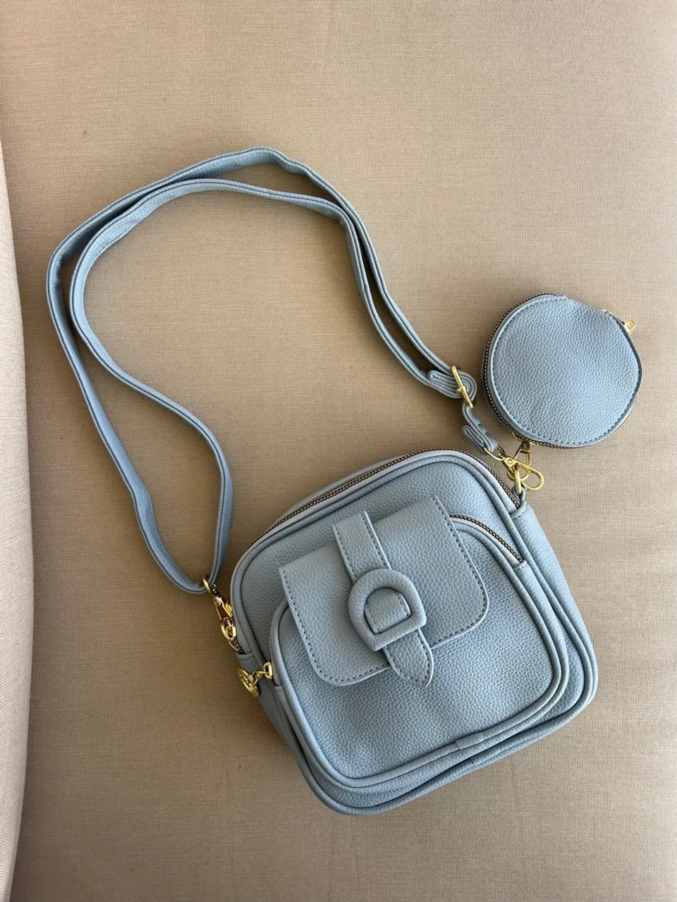 Bolsa de ombro azul com porta-moedas