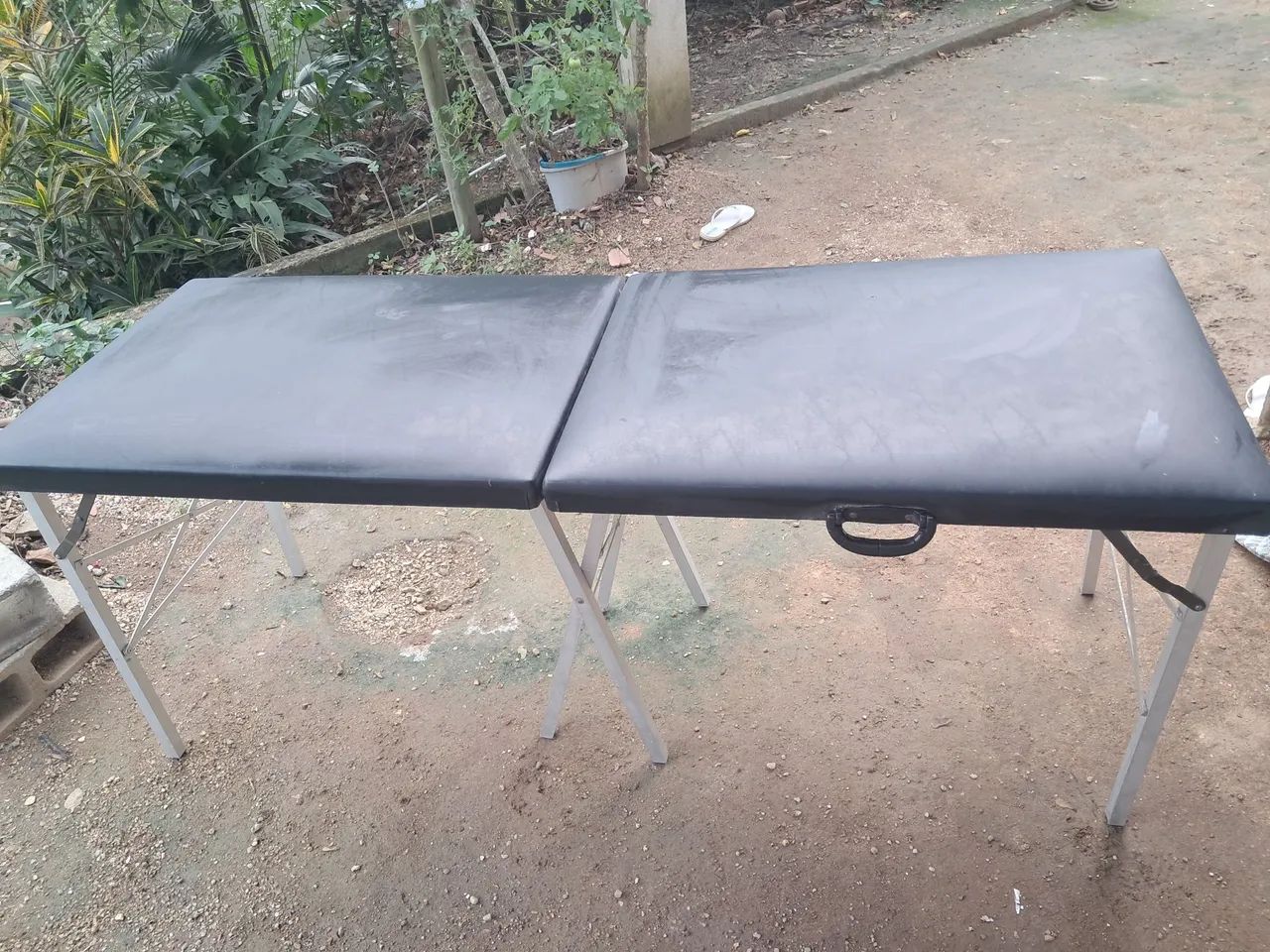 Com marcas de uso e um pequeno rasgo  - Foto 3