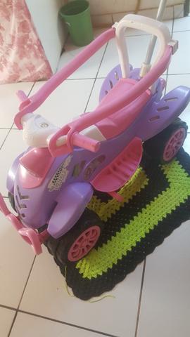 Triciclo menina