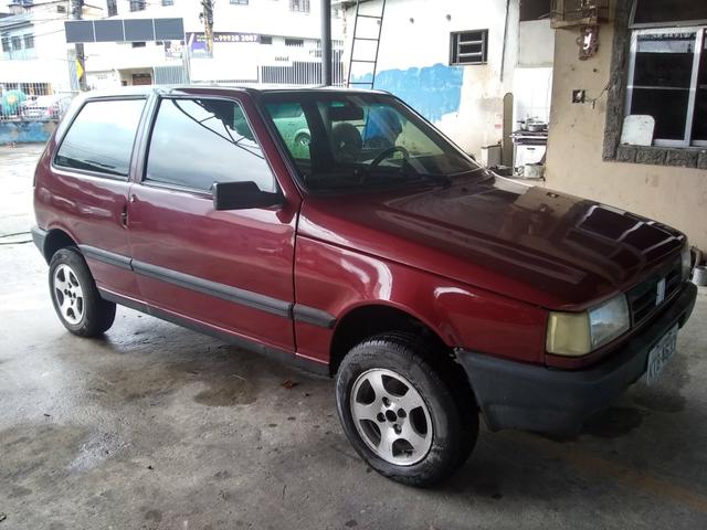 Vendo Fiat uno (faço troca aceito moto )leia o anúncio - Foto 4