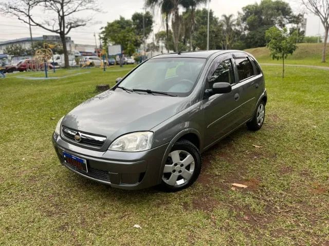 Chevrolet Corsa Hatch 1.4 Mpfi Maxx 8v Flex 4p Manual Dourado Flex 2012  Usado - Interior Carro