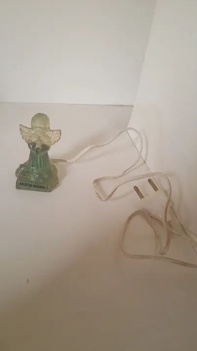 Anjo da guarda antigo que acende 