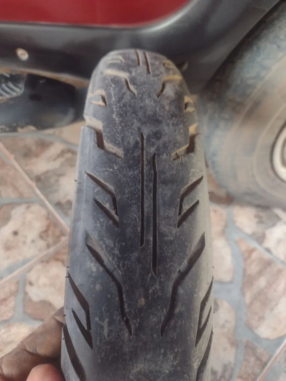 Vendo este Pneu de moto trazeiro da biz