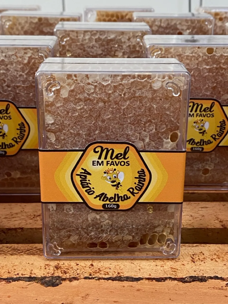 Favos de mel em embalagens de acrílico