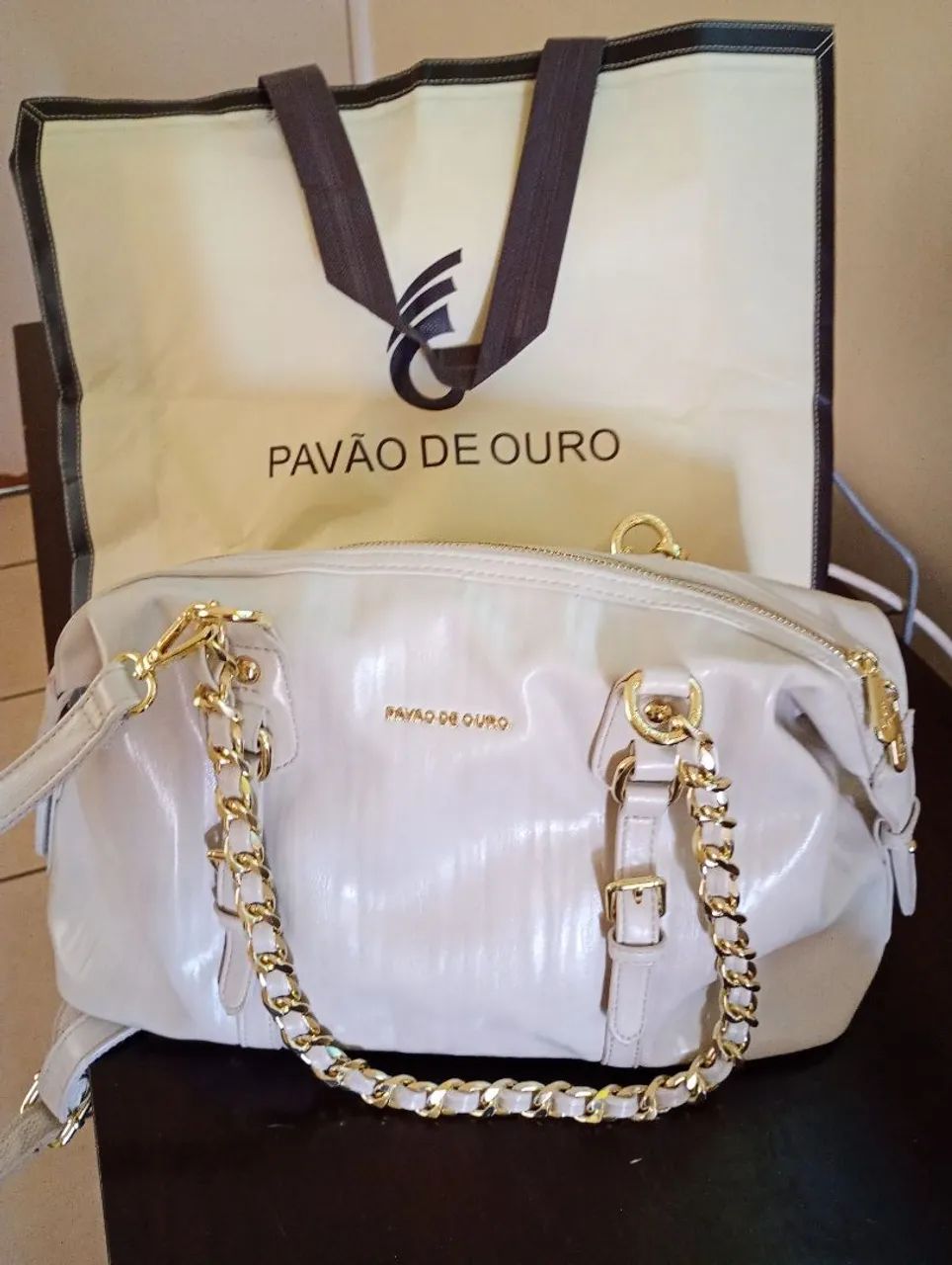 Bolsa pavão de ouro 