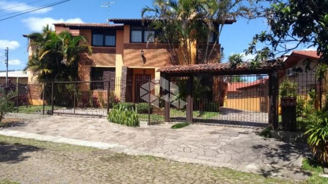 Casa à venda com 5 dormitórios em Guarujá, Porto alegre cod:SO1036