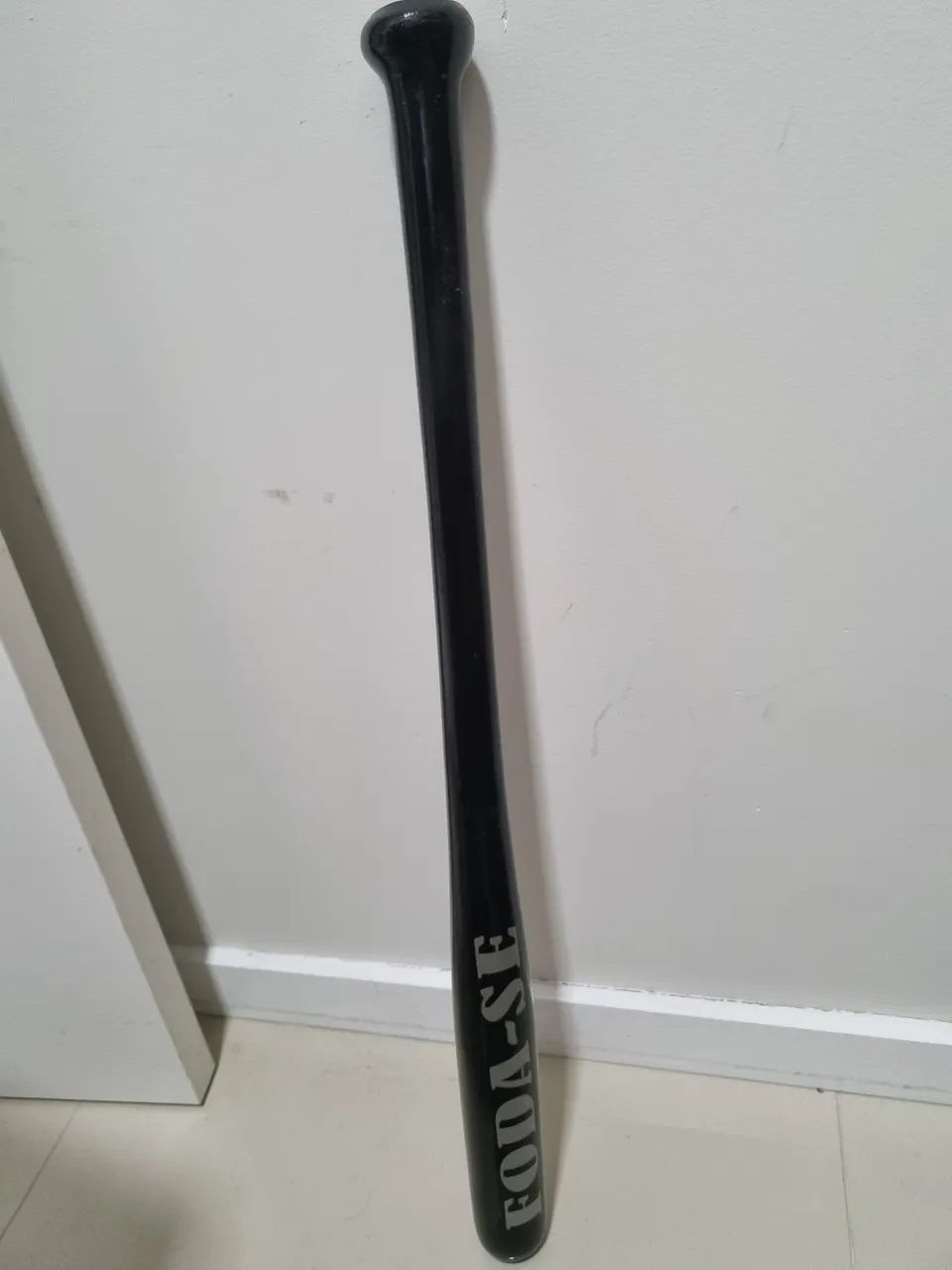 Taco de baseball preto