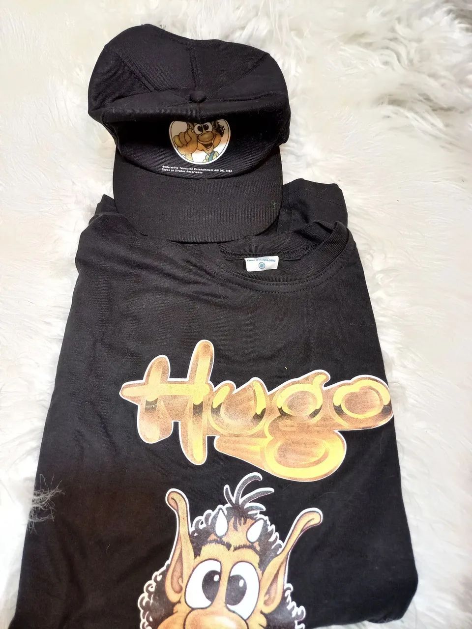 2 Kit Vintage Hugo Game Anos 90 (CNT/Gazeta) -  Camiseta + Boné + Bag - Foto 3