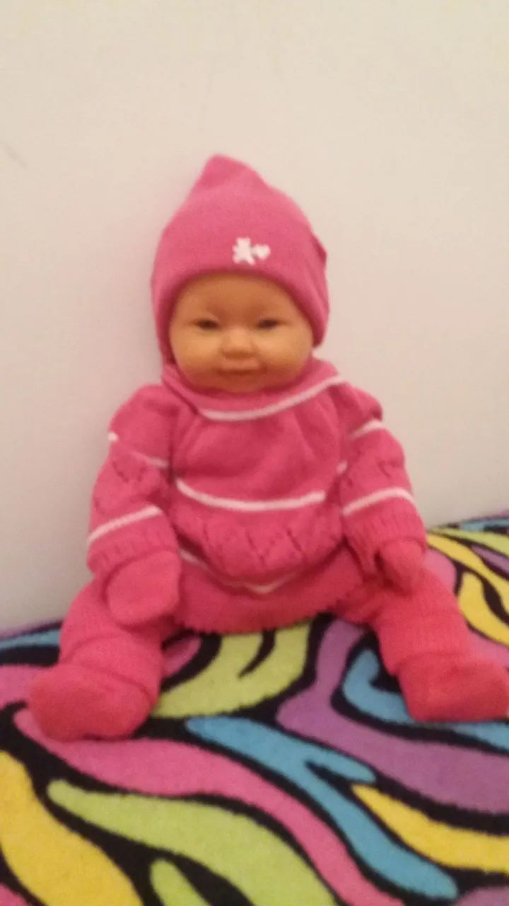 Boneca bebê com roupas cor de rosa - Foto 5
