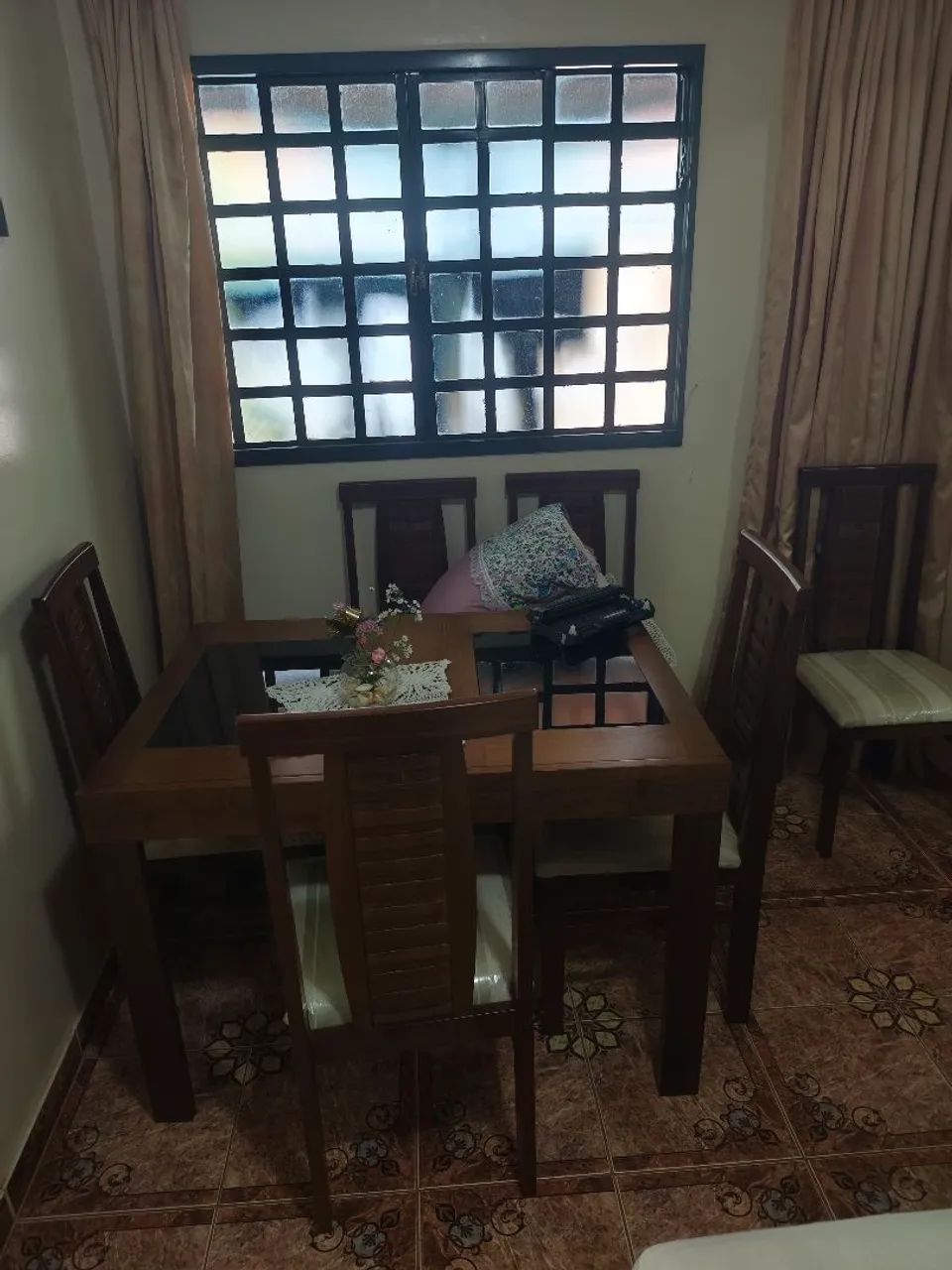 Selling wooden dining table with 6 chairs