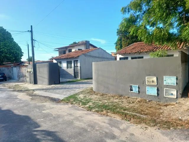 ALUGO EXCELENTE CASA COM 2 QUARTOS, GARAGEM e QUINTAL