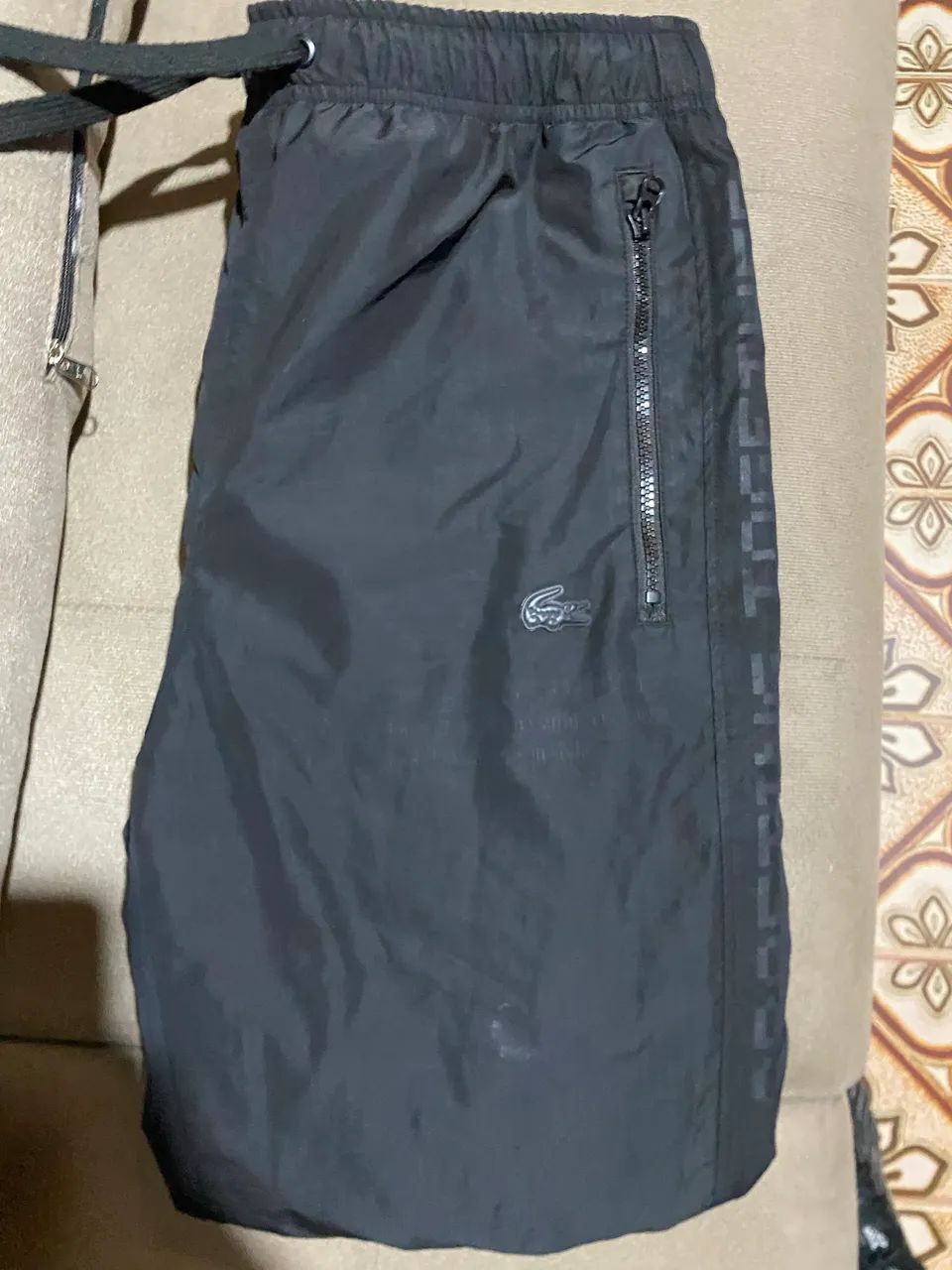 Calça Lacoste edição Minecraft