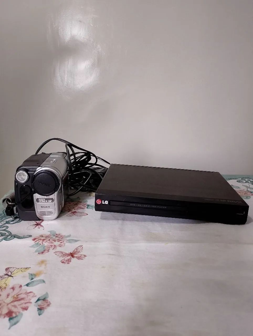 Máquina filmadora e DVD