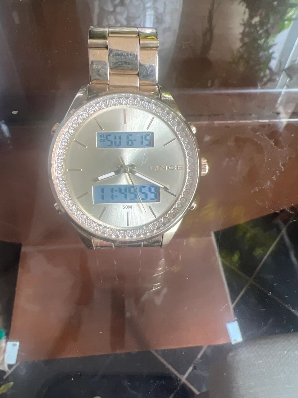 Vendo Relógio Lince dourado usado conservado 