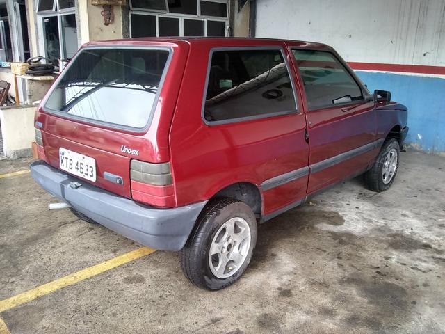Vendo Fiat uno (faço troca aceito moto )leia o anúncio - Foto 5