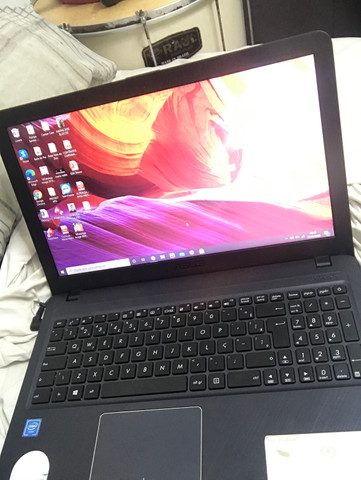 Vendo notebook Asus semi novo