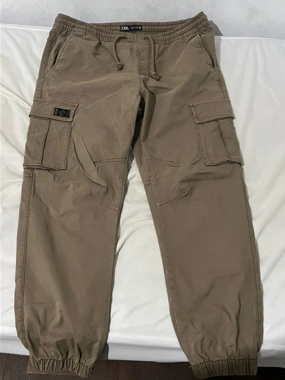 Calça Cargo DNWR Bege - Nova - Foto 4