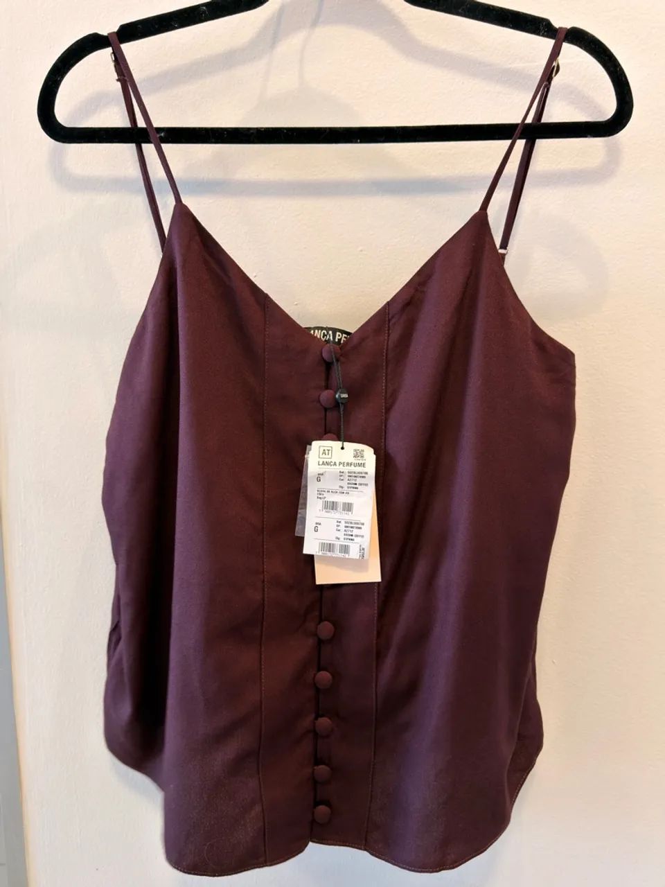 Blusa lança Perfume 