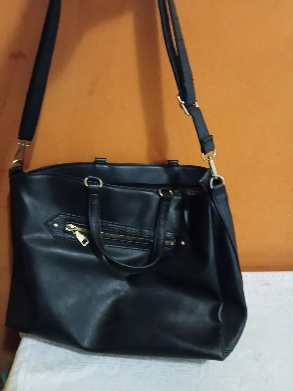 Bolsa couro.
