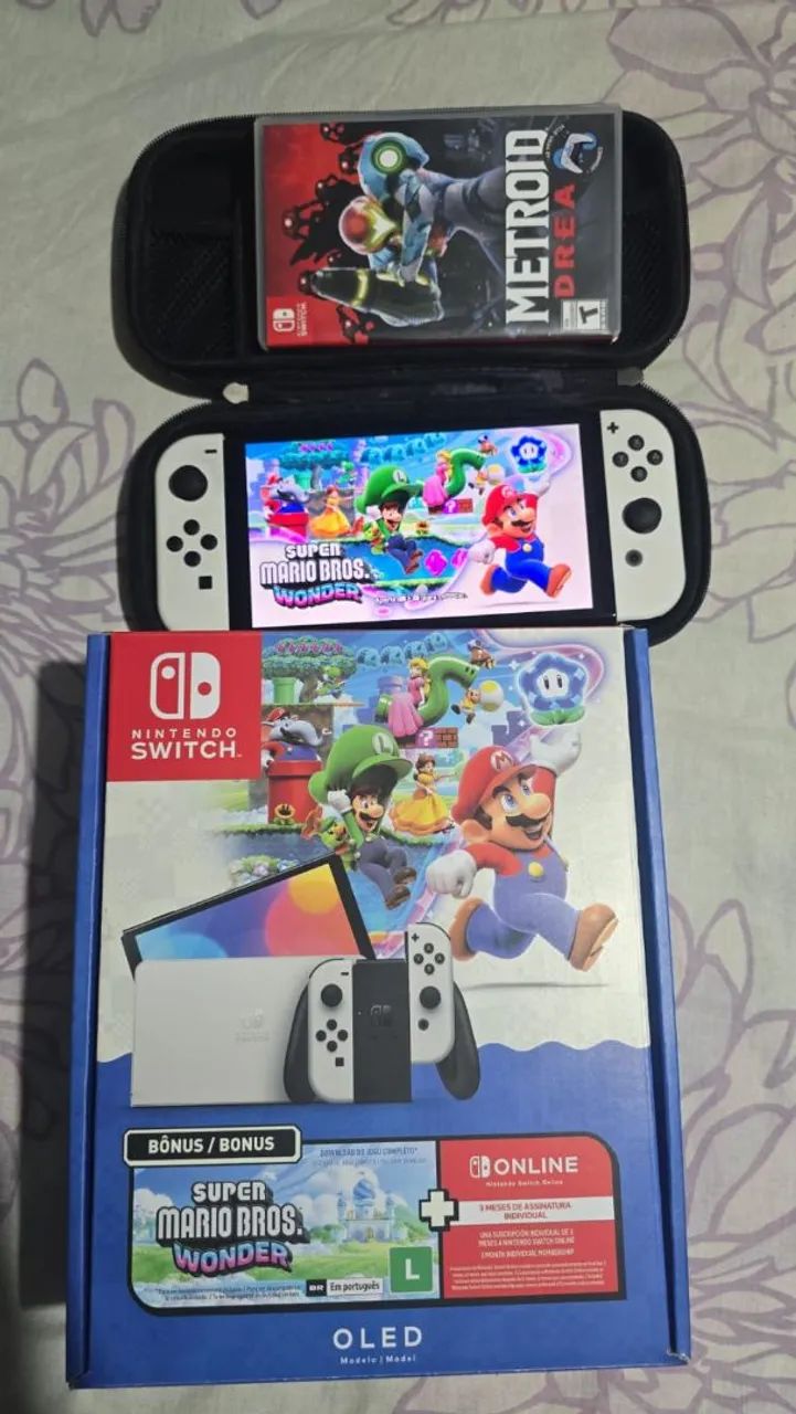 Vendo nintendo switch oled bloqueado com 2 anos de garantia  - Foto 2
