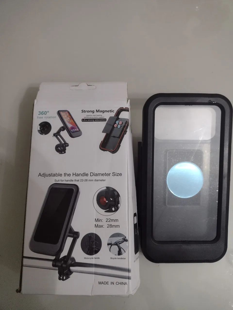 Vendo suporte pra celular novo 
