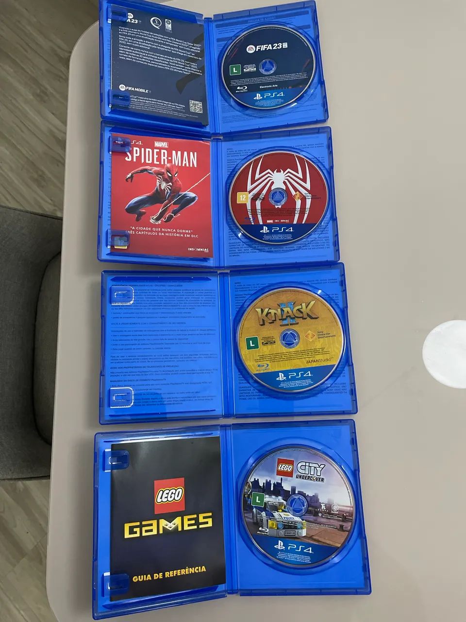 Jogos PS4 - FIFA 23 - Spider-man - Knack 2 - Lego City Undercover