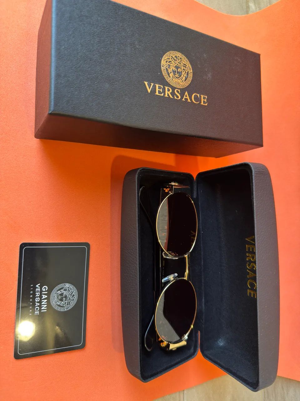 Óculos de sol dourado oval Versace Novo - Foto 5