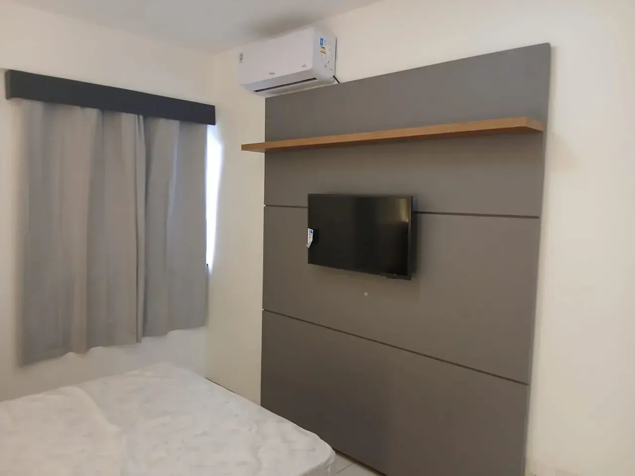 locação flat ao lado da praia